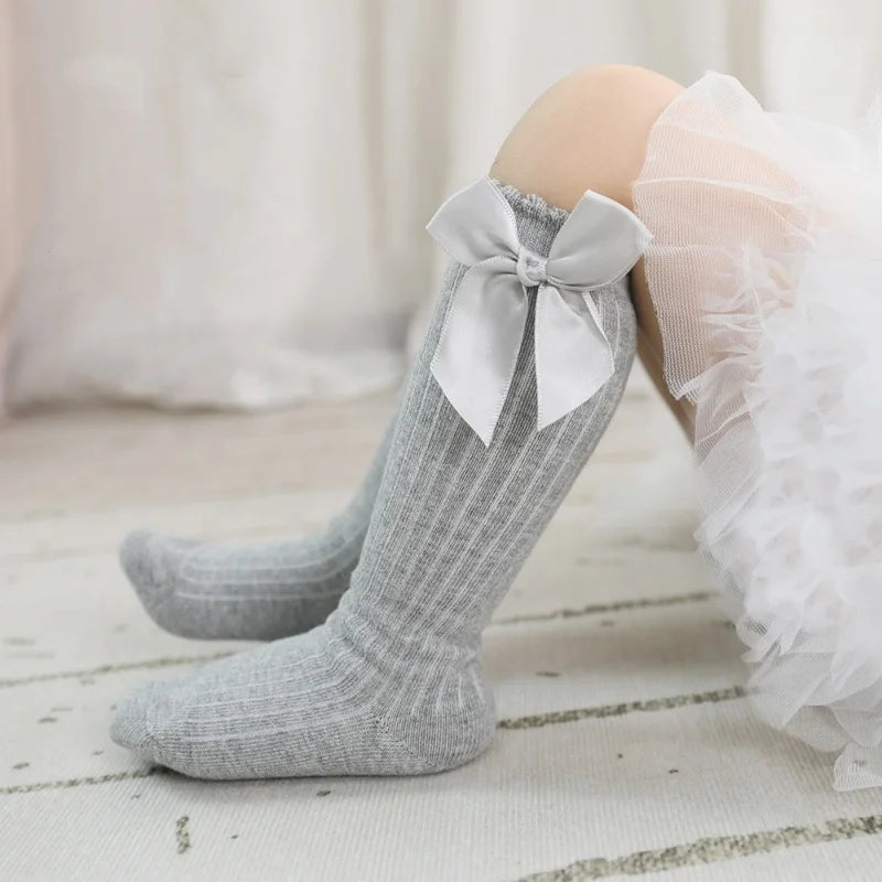 Meias infantis para meninas com laço grande, meias longas até o joelho para crianças, primavera outono, princesa, bebê, sólido, macio, elegante, algodão, 0-7 anos